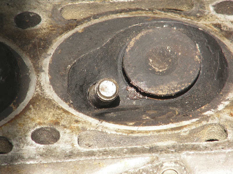 spark plug hole stripped. do i have to take the head off? ﻿ BMW 2002