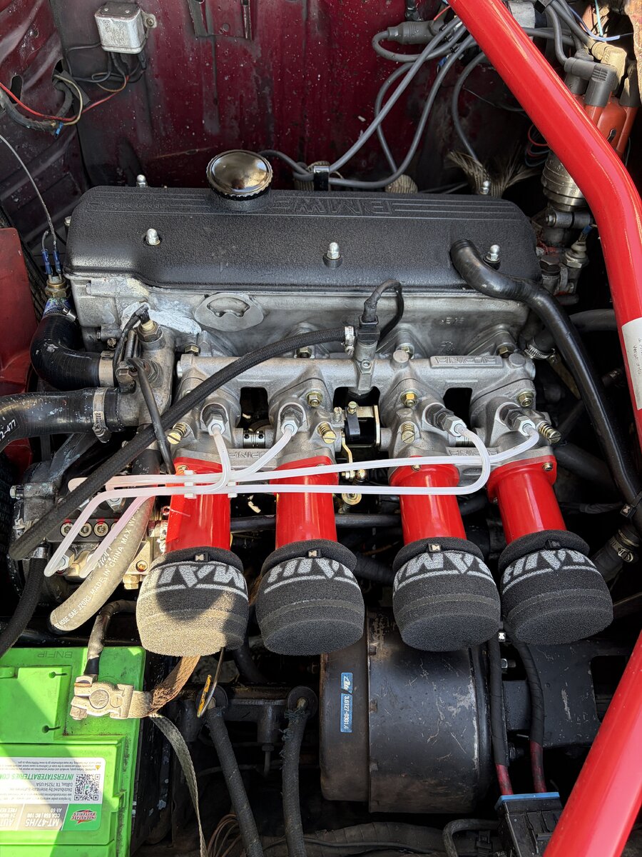 A close look under the hood at a BMW engine and individual intake filters